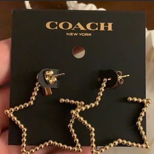 Coach star earrings